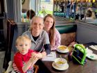 Staff with family at Les Brothers Restaurant in Oak Lawn