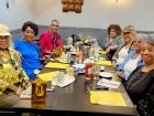 Friends enjoying lunch at Les Brothers Restaurant in Oak Lawn