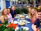 Family enjoying dinner at Mykonos Greek Restaurant in Niles