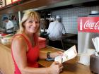 Happy customer enjoying lunch at Nick's Drive In Restaurant Chicago