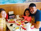 Happy customers enjoying lunch at Nick's Drive In Restaurant Chicago