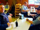 Police officers enjoying lunch at Nick's Drive In Restaurant Chicago