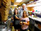 Young customers with staff at Nick's Drive In Restaurant Chicago