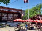 Spacious outdoor beer garden at Niko's Red Mill Tavern in Woodstock