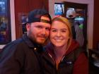 Couple enjoying live music at Niko's Red Mill Tavern in Woodstock