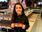 Young bakery customer at Papagalino Cafe & Pastry Shop in Niles