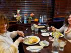 Friends enjoying dinner at Rose Garden Cafe in Elk Grove Village 