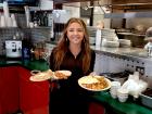 Friendly server with breakfast at The Canteen Restaurant in Barrington