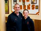 Father and daughter getting carryout at The Works Gyros in Glenview