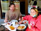 Couple enjoying outdoor lunch at The Works Gyros in Glenview