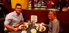 Couple enjoying dinner at Andrew's Open Pit & Spirits in Park Ridge