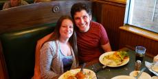 Couple enjoying dinner at Andrew's Open Pit & Spirits in Park Ridge