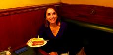 Birthday girl celebrating at Andrew's Open Pit & Spirits in Park Ridge