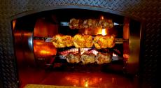 The chicken rotisserie at Andrew's Open Pit & Spirits in Park Ridge