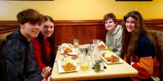 Friends enjoying breakfast at Annie's Pancake House in Skokie