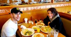 Couple enjoying breakfast at Apple Villa Pancake House in Hoffman Estates