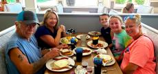 Family enjoying breakfast at Bentley's Pancake House & Restaurant Wood Dale