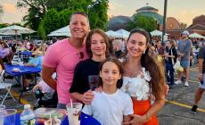 Family enjoying the Big Greek Food Fest of Niles