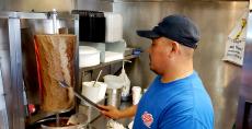 Slicing the famous gyros at Billy Boy's Restaurant in Chicago Ridge