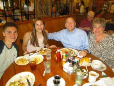 Family enjoying breakfast at Billy's Pancake House in Palatine