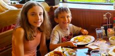 Siblings enjoying lunch at Billy's Pancake House in Palatine