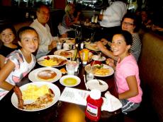 Family enjoying breakfast at Blossom Cafe in Norridge