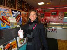 Happy customer getting carry-out at Bo-Bo's Restaurant in Deerfield