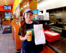 Happy carryout customer at Brandy's Gyros in Chicago