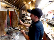 Slicing the famous gyros at Brandy's Gyros in Chicago