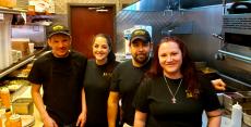 Hard working kitchen staff at Brandy's Gyros in Hanover Park