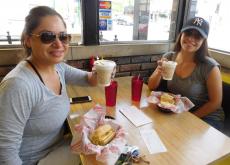 Friends enjoying breakfast at Burger Baron Restaurant in Chicago