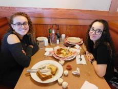 Friends enjoying breakfast at Butterfield's Pancake House & Restaurant in Northbrook