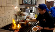 Burgers on The Grill at Charcoal Delights Restaurant in Chicago