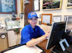 Friendly staff at Charcoal Delights Restaurant in Chicago