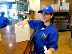 Friendly staff at Charcoal Delights Restaurant in Chicago