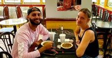 Couple enjoying lunch at Charcoal Flame Grill in Morton Grove