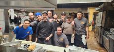 Hard working kitchen crew at Charcoal Flame Grill in Morton Grove