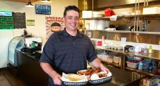 Customer enjoying lunch at Charkie's Restaurant in Carol Stream