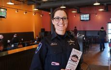 Police officer enjoying lunch at Charkie's Restaurant in Carol Stream