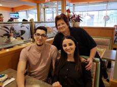 Customers with staff at Christy's Restaurant & Pancake House in Wood Dale