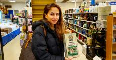 Customer shopping at Columbus Food Market & Gifts in Des Plaines