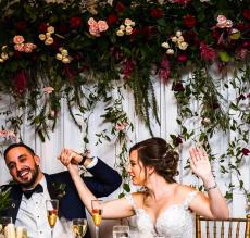 Happy newlyweds celebrating at Concorde Banquets in Kildeer