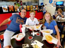 Family enjoying lunch at Craving Gyros in Lake Zurich