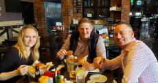 Friends enjoying lunch at Draft Picks Sports Bar in Naperville