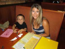 Mother and son enjoying breakfast at Eggs Inc. Cafe in Bolingbrook