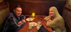 Couple enjoying dinner at Ellwood Steak and Fish House in DeKalb