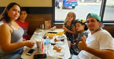 Family enjoying lunch at Franksville Restaurant in Chicago