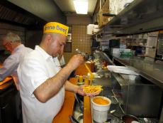 Hard working kitchen crew at Franksville Restaurant in Chicago