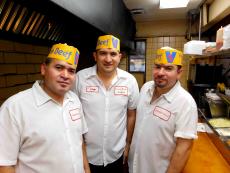 Hard working kitchen crew at Franksville Restaurant in Chicago