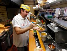 Hard working kitchen crew at Franksville Restaurant in Chicago